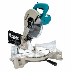 A Makita miter saw from a renowned manufacturer features a large circular blade and teal-colored handle. It boasts an adjustable base, dust collection bag, and clear view fence for enhanced precision.